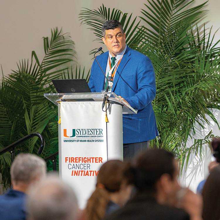 Alberto Caban-Martinez, D.O., Ph.D., M.P.H., addresses the attendees of the inaugural symposium.