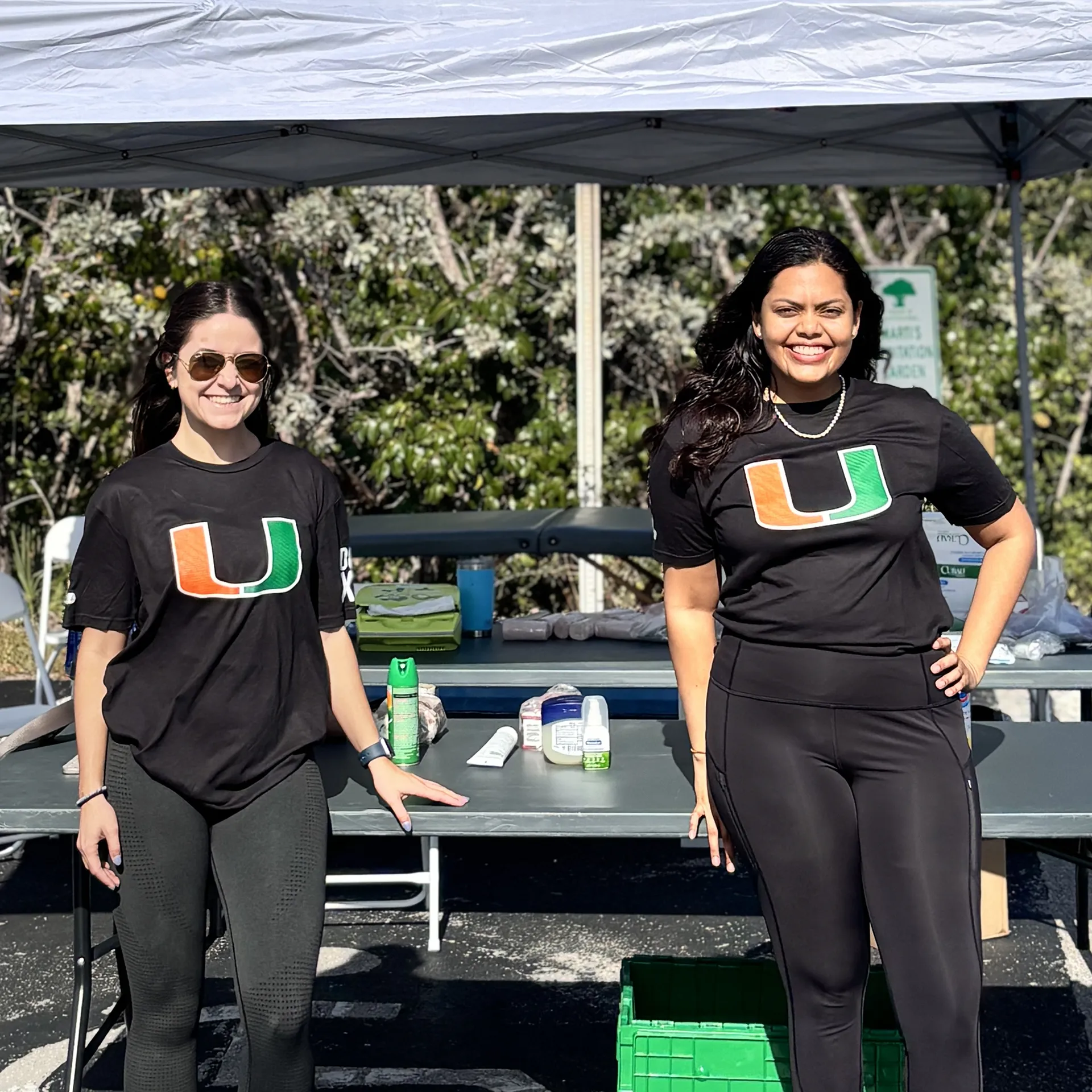Two nurses in black at the medical tent at DCC